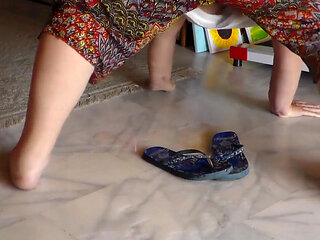 Jen is peeing on her bath slippers