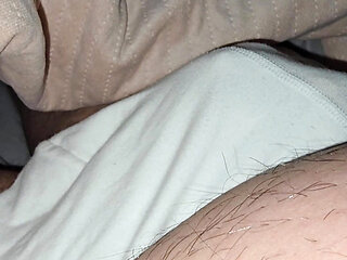 Step son allows step mom hand slip under his underwear and handjob his dick fir her pleasure