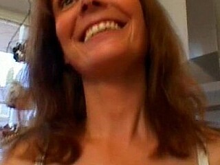 Hot MILF gives a sloppy blowjob before getting pounded in the kitchen