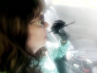 MATURE BRUNETTE MRS. ROMAN CAR SMOKING HER MORE 120 MENTHOLS IN HER BLACK CIGARETTE HOLDER