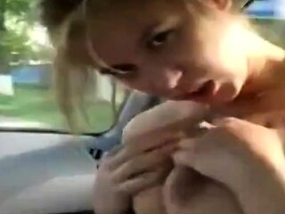 Fingering Her Big Tits Outdoors in the Car