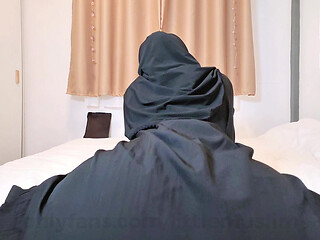 A Naughty Malaysian Hijabi Doing Porn Showing Off Her Ass In Abaya