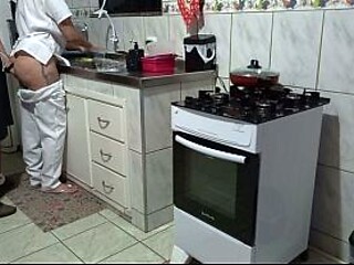 Busty maid gets her ass pounded in the kitchen