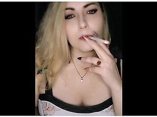 Blonde seductress lights up while teasing between intimate acts