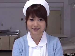 Nurse in sexy nylon stockings is being fucked by her couple