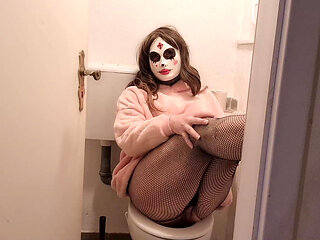 Young trans woman jerks off in the toilet