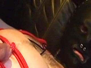 Mature Mistress Binds Masked Sub for Hot Wax Play