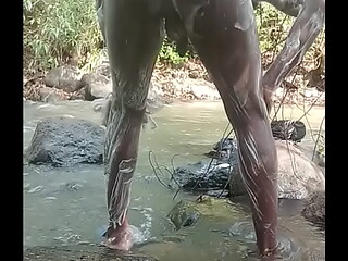 Big black dick guy masturbation while taking a shower outdoors and shooting big load