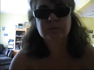 Liz busy playing with her big tits
