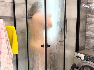 Stepson catches a peek at his stepmom in the shower