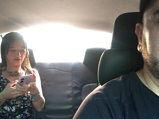 Latina girl encourages Uber driver to have sex on her way to work.