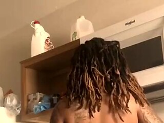 Sexy Ebony MILF cooks up some excitement for voyeurs