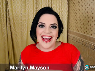Busty Marilyn Mayson shows off in a tight dress