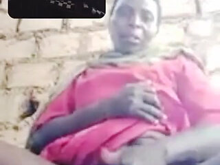 Hadzabe Tribe Mature Woman on Video Call with BF, Don't Ask Me Where She Got the Phone.