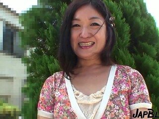 Japanese MILF craves a creamy treat
