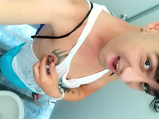 Showing Pierced Nipples and Uncut Cock at Public Toilet Cabin