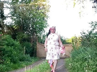 In an outfit with a new summer dress for an evening