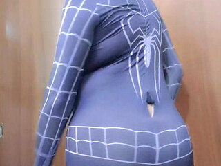 Spider-Man strips naked and shows his ass.