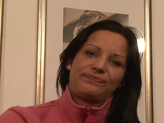 Attractive German slut plays with orange dildo