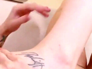 Redhead teen loves licking her tattooed lesbian friend