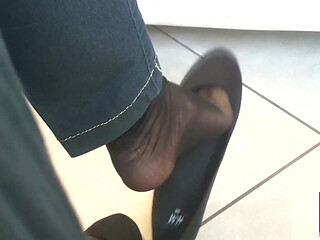 Dangling in Black Flats and Black Nylon Socks