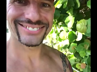 JUST A HAPPY GUY WALKING ON THE BEACH LIVING HIS BEST LIFE TAN FIT  LIFEGUARD PORNSTAR