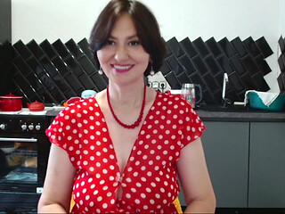her polka-dot dress spread to the sides