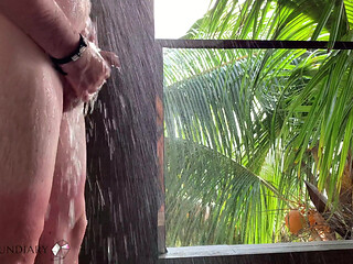 Romantic shower after sex in paradise