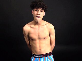 Curly twink boy shows off his slim body on webcam