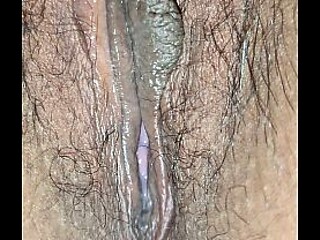 Latina wife gets her pretty and hairy pussy stuffed with a big toy.