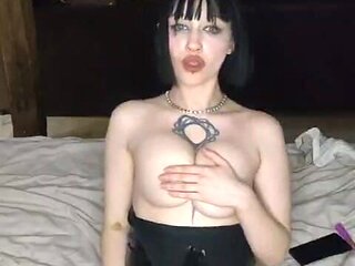 A Cowgirl in Leather Is Hotly Squeezing Her Tits and Waiting for a Big Dick!