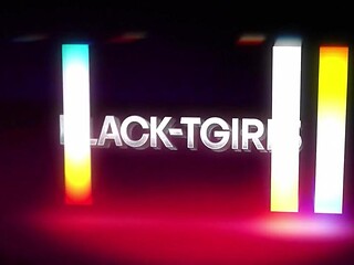 Cute black TG girl teases big tits in striptease routine