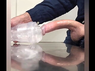 Stroking curved BWC and cumming in clear fleshlight