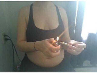 Belly button play turns into a smoke-filled seduction