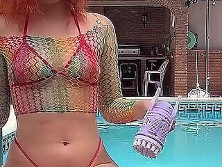 Having Fun with Bubble Maker Nearby Pool