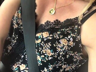 Outdoor solo masturbation scene with curly blonde