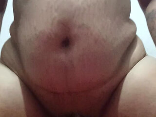 A young beauty with a big ass masturbates her pussy with a jar of cream