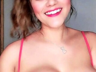 Busty curly brunette with big boobs fucks on couch