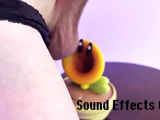 Hot Glue Covering Toy Figure in Cum