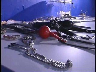 Kinky redhaired slut in bondage gets nipples teased