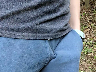 Rubbing myself through my shorts pocket while hiking until I have to stop and cum on the trail