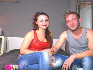 Tattooed German babes share a big dick in hot threesome