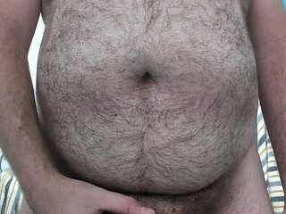 Big hairy chubster shooting a load