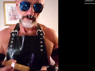 Stepdad lighting his Cigar in rubber apron