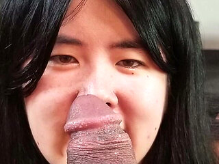 Chinese Girl Fits Her Tiny Mouth Around a Thick Black Cock
