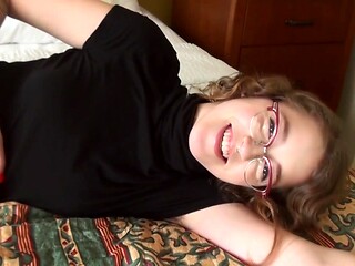 Bold brunette in glasses teases with natural tits and fingers herself senseless in a lacy thong
