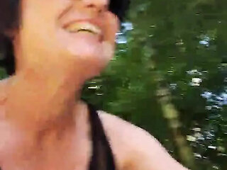 Julie shows vagina while riding a bike