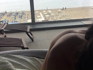 Public Blowjob in front of hotel open window