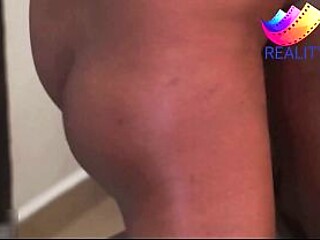 AN AFRICAN PORN STAR GET A HARDCORE DOGGY STYLE POUND ON HER BIG ASS