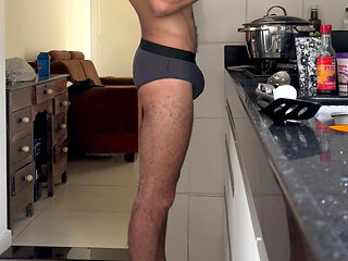 Alpha male with big dick marking his underwear cooking